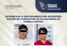 Detiene FGE a dos hombres por secuestro exprés de conductor de plataforma en Puebla capital.